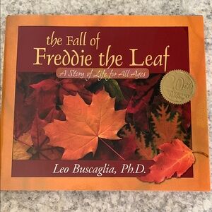 Autumn Holiday Book with Orange and Red Leaves